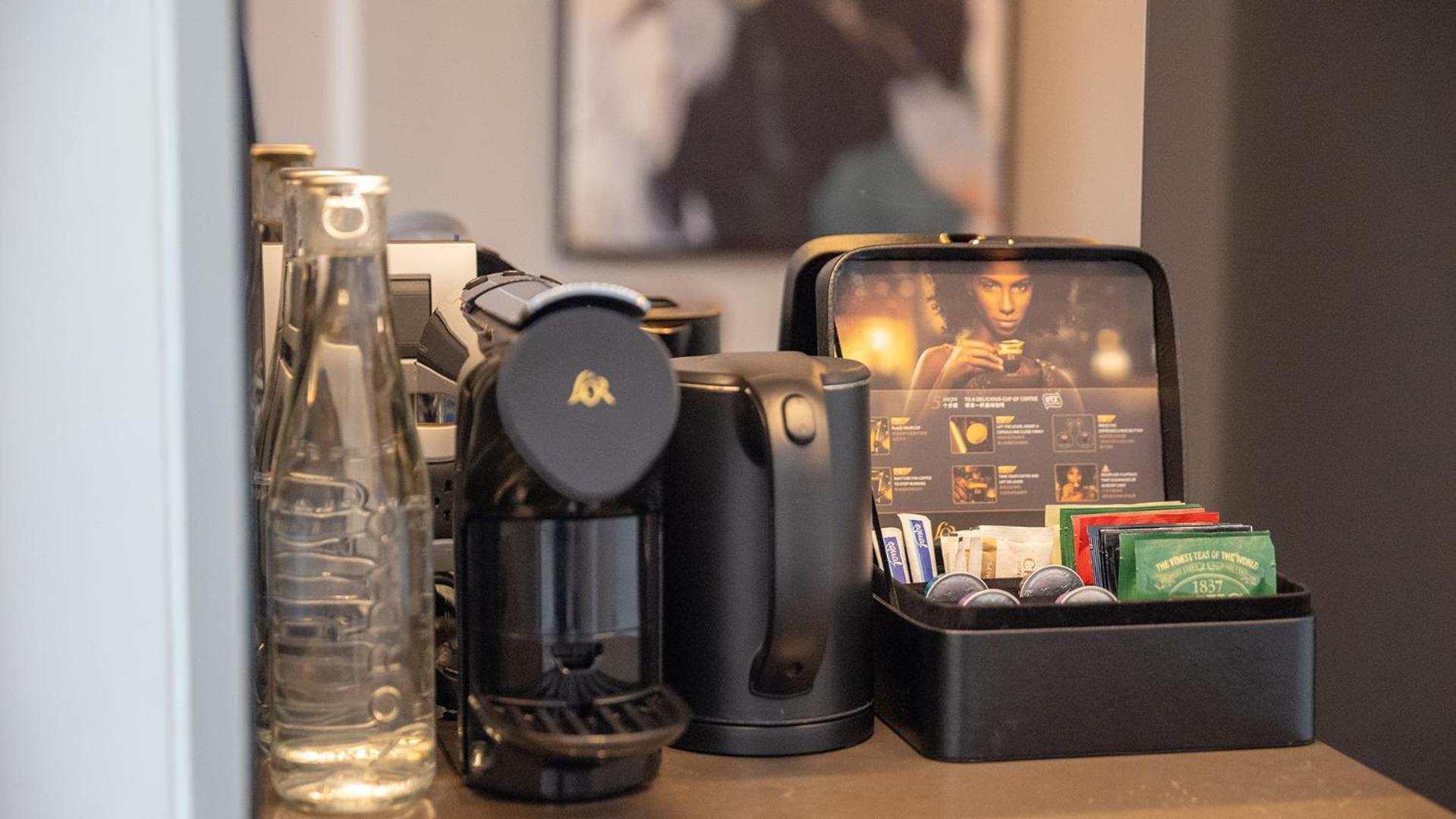 Chatrium Grand Bangkok Exteriör bild A Nespresso coffee machine